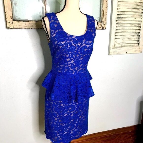 Beautiful Lace Peplum Dress by Explosion - Picture 12 of 13